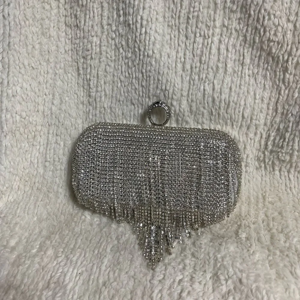 Elegant Silver Clutch with Rhinestone tassels Detailing.